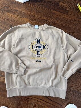 Nike Tan Crewneck Sweatshirt with Embroidered Navy & Yellow Logo